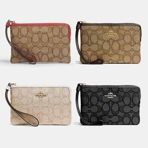 Corner Zip Wristlet In Signature Canvas